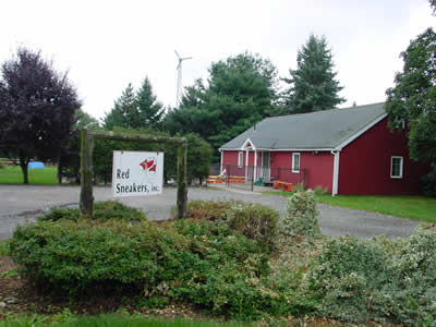 Red Sneakers building entrance with sign